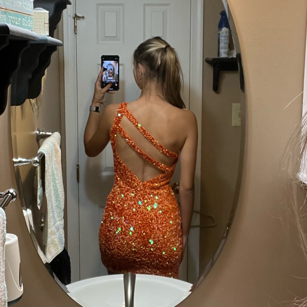 Orange sparkly mini dress